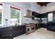 Modern kitchen features stainless steel appliances and granite countertops at 501 Journey Sw St, Concord, NC 28025