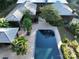 Aerial view of house, pool, and detached four-car garage at 501 Journey Sw St, Concord, NC 28025