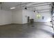 Spacious garage with high ceilings, and multiple garage doors at 501 Journey Sw St, Concord, NC 28025