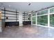 Bright living room with hardwood floors and large windows at 501 Journey Sw St, Concord, NC 28025