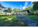Mid-century modern home with expansive windows at 501 Journey Sw St, Concord, NC 28025