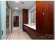 Bathroom with double vanity and large walk-in closet at 501 Journey Sw St, Concord, NC 28025