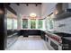 Modern kitchen with stainless steel appliances and a large island at 501 Journey Sw St, Concord, NC 28025
