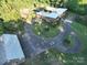 Aerial view showcasing home, pool, and detached garage at 501 Journey Sw St, Concord, NC 28025