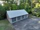 Aerial view of four-car garage with large paved area at 501 Journey Sw St, Concord, NC 28025