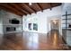 Living room with hardwood floors, fireplace and view to hallway at 501 Journey Sw St, Concord, NC 28025