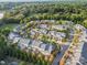 Aerial view of community with houses and green spaces at 607 Pine Links Dr, Tega Cay, SC 29708