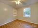 Bedroom with built-in shelving and a large window at 3980 Fish Pond Rd, Salisbury, NC 28146