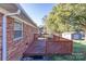 Back deck with wood railings overlooking backyard at 2629 Paula Dr, Gastonia, NC 28054