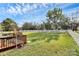 Large backyard with deck and white fence at 1333 Mcdowell Farms Dr, Charlotte, NC 28217