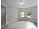 Bright living room with hardwood floors and large windows at 2223 Mancke Dr, Rock Hill, SC 29732