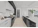 Modern kitchen with stainless steel appliances and a large island with sink at 5428 Carmel Rd, Charlotte, NC 28226