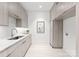 Modern laundry room with ample cabinetry and counter space at 5428 Carmel Rd, Charlotte, NC 28226