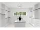 Large walk-in closet with ample hanging space and built-in shelving at 5428 Carmel Rd, Charlotte, NC 28226