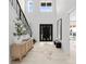 Bright entryway with hardwood floors and staircase at 5428 Carmel Rd, Charlotte, NC 28226