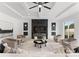 Living room features a large fireplace and seating at 5428 Carmel Rd, Charlotte, NC 28226