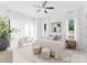 Spacious primary bedroom with large windows and natural light at 5428 Carmel Rd, Charlotte, NC 28226