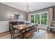Elegant dining room with a large farmhouse table and plenty of natural light at 235 Grey Rd, Davidson, NC 28036