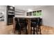 Basement wet bar with quartz countertop and modern appliances at 235 Grey Rd, Davidson, NC 28036