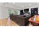 Finished basement recreation room with fireplace and built-in shelving at 235 Grey Rd, Davidson, NC 28036