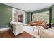 Home office with built-in desk and view into main living area at 235 Grey Rd, Davidson, NC 28036