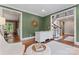 Home office with built-in desk and view of staircase at 235 Grey Rd, Davidson, NC 28036