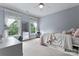 Bright bedroom with two windows and built-in storage at 235 Grey Rd, Davidson, NC 28036