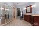 Spacious bathroom with walk-in shower and large vanity at 235 Grey Rd, Davidson, NC 28036