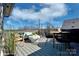 Spacious rooftop deck with seating and city views at 2220 N Graham St # 7, Charlotte, NC 28206