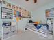 Themed bedroom with a collection of anime and manga, and plenty of storage at 11719 Ridgeway Park Dr, Charlotte, NC 28277