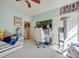 Spacious bedroom with a desk, chair, and plenty of natural light at 11719 Ridgeway Park Dr, Charlotte, NC 28277