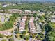 Aerial view of townhouses with surrounding green space at 11719 Ridgeway Park Dr, Charlotte, NC 28277