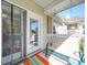 Private balcony with sliding glass doors and outdoor seating at 11719 Ridgeway Park Dr, Charlotte, NC 28277