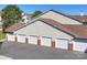 Attached garages with brick accents and ample parking at 11719 Ridgeway Park Dr, Charlotte, NC 28277