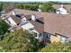 Rooftop view of building with brown shingles and white accents at 11719 Ridgeway Park Dr, Charlotte, NC 28277