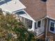 Partial view of a condo building from above showing the exterior and private balcony at 11719 Ridgeway Park Dr, Charlotte, NC 28277