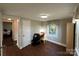 Simple bedroom with a desk and window, near another bedroom at 2346 Timberland Hills Dr, Newton, NC 28658