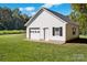 Detached white garage with single door and window at 129 Clodfelter Rd, Mooresville, NC 28115