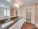 Elegant bathroom with double vanity and walk-in shower at 131 Renville Pl, Mooresville, NC 28115
