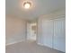 Cozy bedroom with neutral wall colors and double door closet at 131 Renville Pl, Mooresville, NC 28115