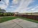 Private backyard with patio and fenced-in area at 131 Renville Pl, Mooresville, NC 28115