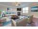 Bright living room with fireplace and hardwood floors at 131 Renville Pl, Mooresville, NC 28115