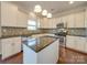 Kitchen with granite counters, stainless steel appliances, and white cabinets at 131 Renville Pl, Mooresville, NC 28115