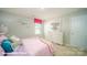 Bedroom with pink bedding and a white dresser at 3676 Mercer St, Terrell, NC 28682