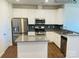 Modern kitchen with stainless steel appliances and granite countertops at 4467 Potters Wheel Dr, Fort Mill, SC 29715