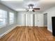 Bright bedroom featuring hardwood floors and ample closet space at 1806 Lane St, Kannapolis, NC 28083