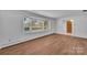 Living room with large window and wood flooring at 4250 N Center St, Hickory, NC 28601