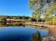 Serene pond with a wooden dock and beautiful reflection at 1011 Ratchford Rd, York, SC 29745