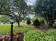 Landscaped front yard with mature trees and lush greenery at 1011 Ratchford Rd, York, SC 29745