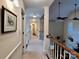 Upstairs hallway with hardwood flooring and access to bedrooms at 1011 Ratchford Rd, York, SC 29745